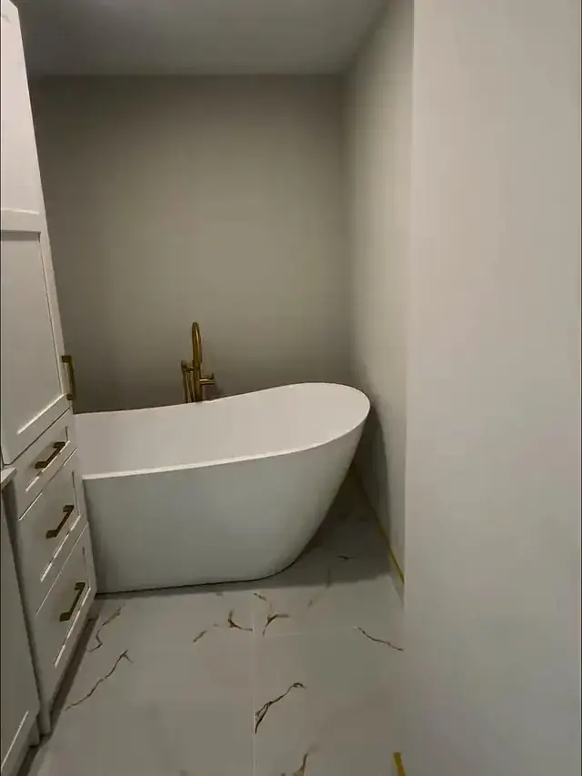 Bathroom with a freestanding tub