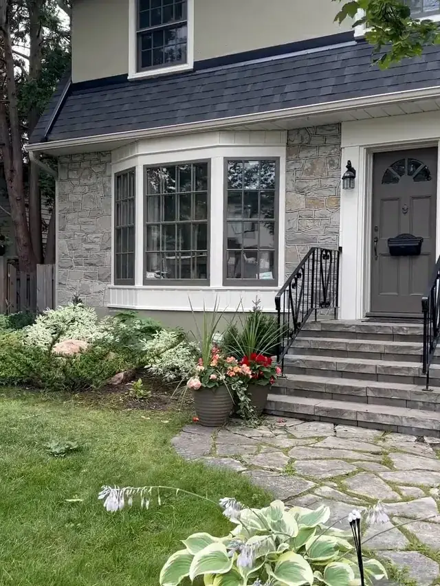 Stone house front with stone steps